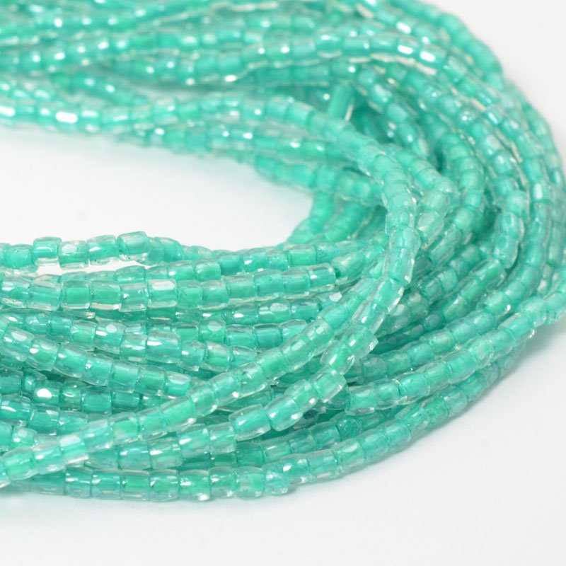Czech Cut Seedbeads - 9/0 - Colour Lined Crystal / Seafoam Green (hank)