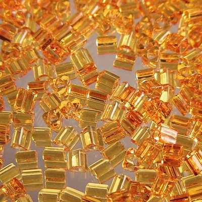 Toho Triangles - 11/0 - Transparent Amber