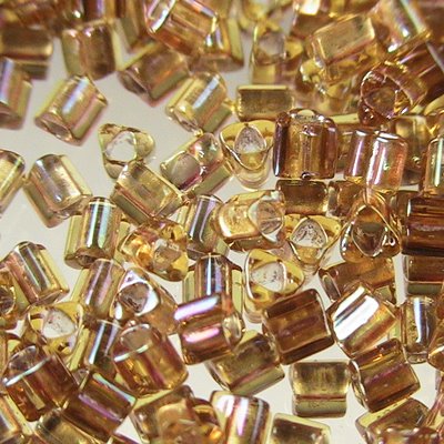 Toho Triangles - 11/0 - Colour Lined Crystal/Light Bronze